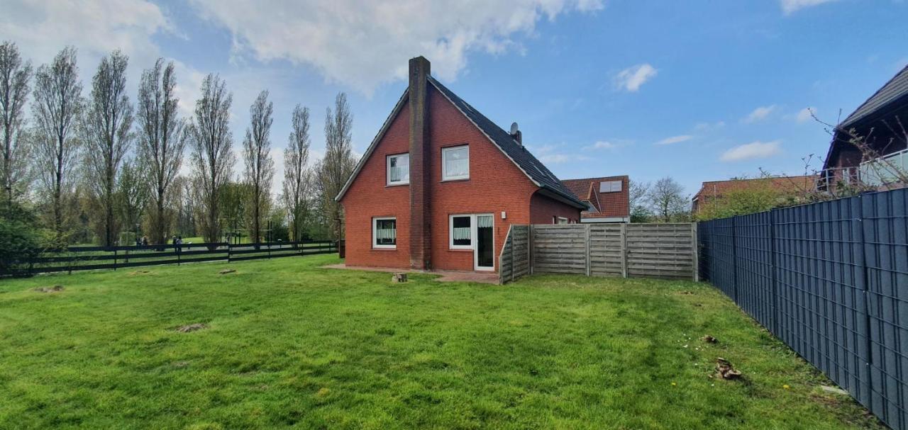 Ferienhaus Am Wellenpark Norddeich Exterior foto